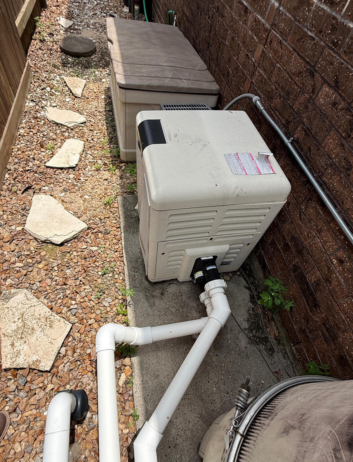 Before install picture Pentair Mastertemp pool heater in Katy Texas by Drew Pools Before picture of a Pentair Mastertemp pool heater install in Katy, Texas, by Drew Pools.